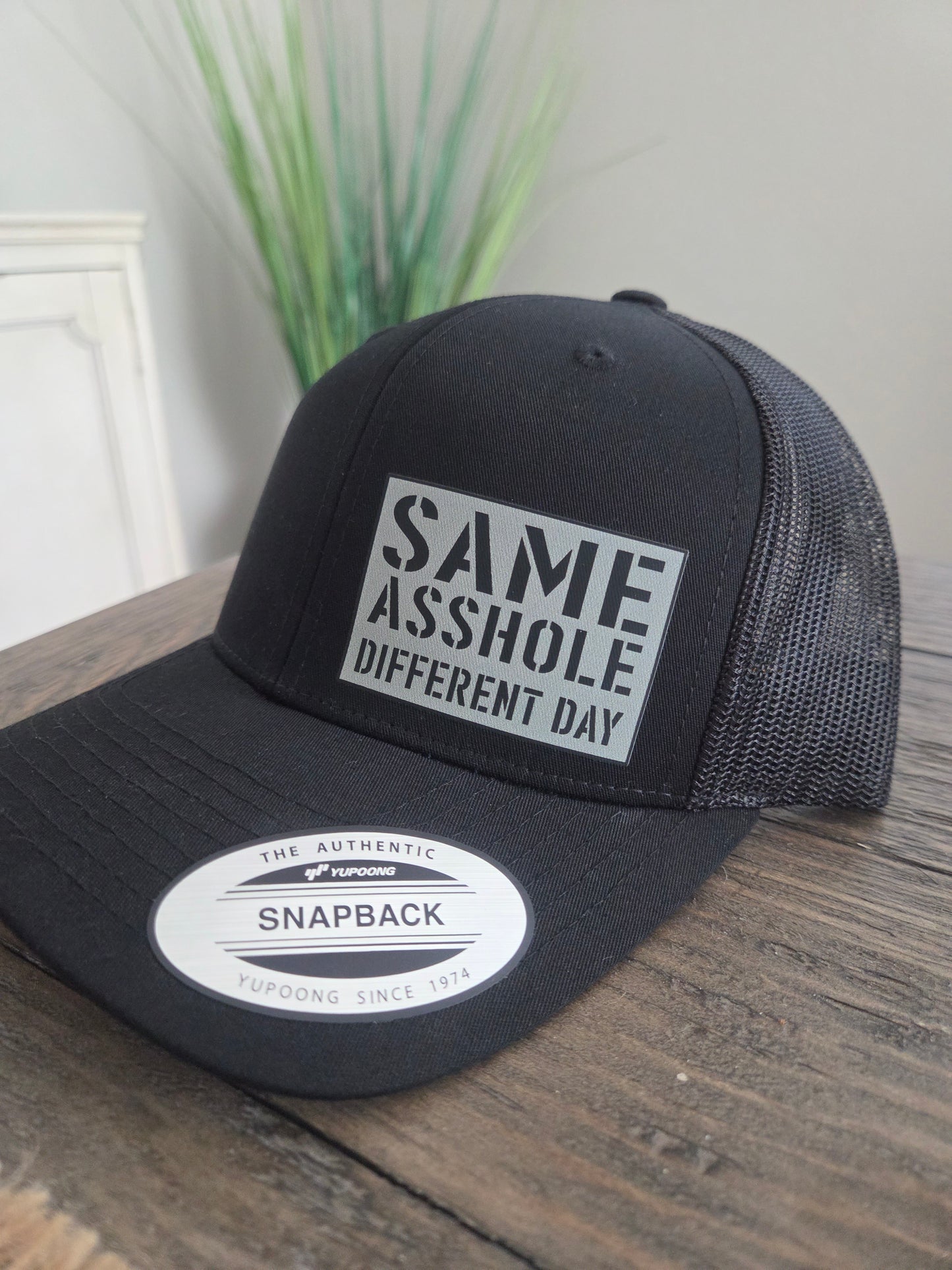 Black Snapback or Flexfit A-hole Hat